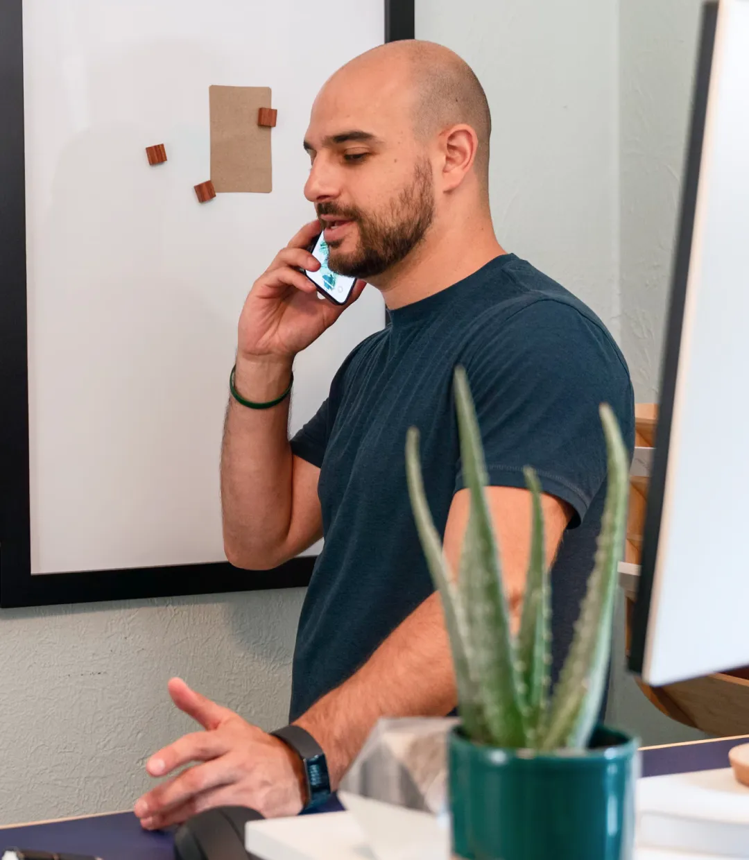 Man making a phone call in his office