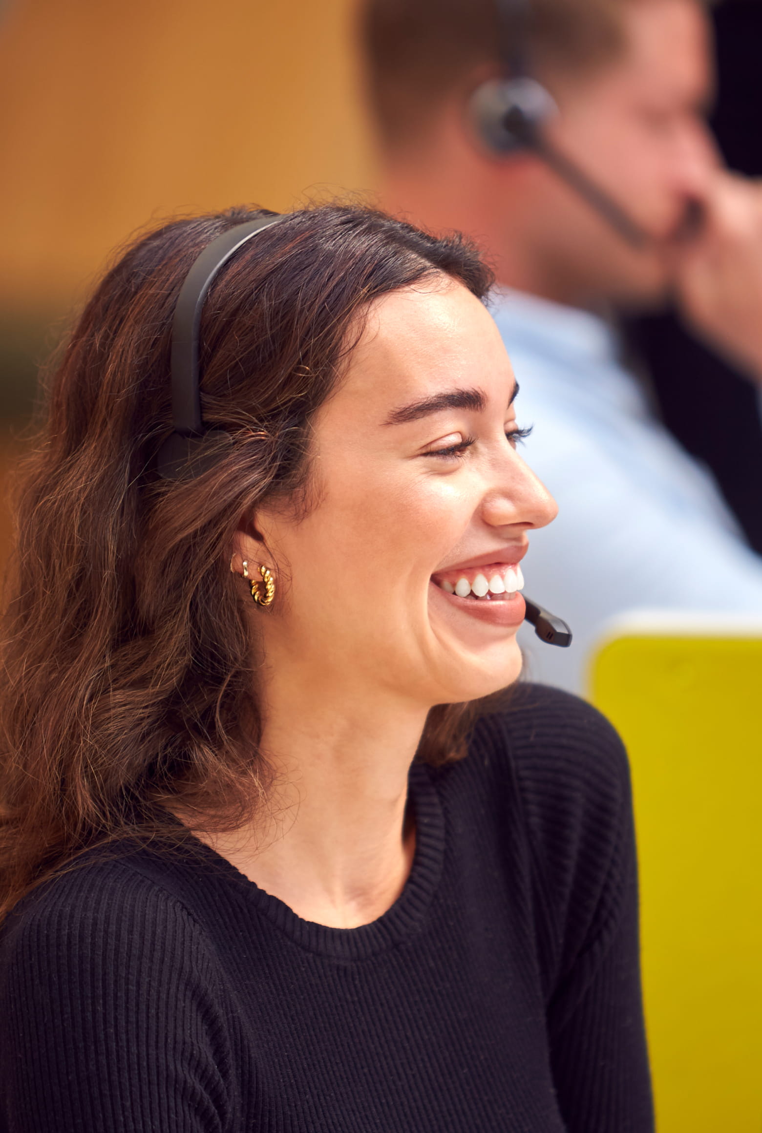 Smiling female call handling agent